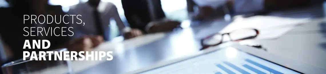 Business people sitting around a conference table having a meeting